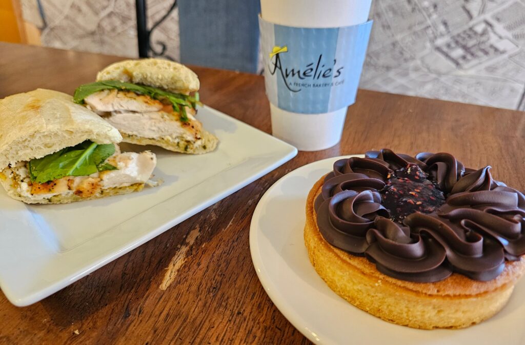 A tart, coffee, and a sandwich from Amelie's French Bakery & Cafe during a visit to ChristmasVille was pure bliss. 