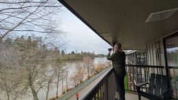 Patio view of Willamette River and riverfront bike trail at Valley River Inn in Eugene, Oregon.